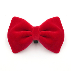 Velvet red bow tie for a dog an elegant ornament for special occasions, attached to the collar