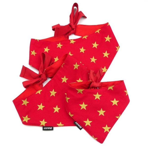 Red Christmas bandana for a dog with golden stars, a handkerchief, a scarf for a pet