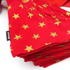 Red Christmas bandana for a dog with golden stars, a handkerchief, a scarf for a pet