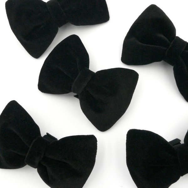 Velvet black bow tie for a dog an elegant ornament for special occasions, attached to the collar