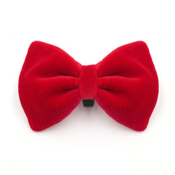 Velvet red bow tie for a dog an elegant ornament for special occasions, attached to the collar