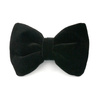 Velvet black bow tie for a dog an elegant ornament for special occasions, attached to the collar