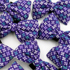 Violet Bow Tie Bow for a dog with four-leaf clovers, attached to a collar