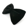 Velvet black bow tie for a dog an elegant ornament for special occasions, attached to the collar