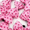 A pink bow tie with hearts for the Dog for Valentine's Day, Psiakrew